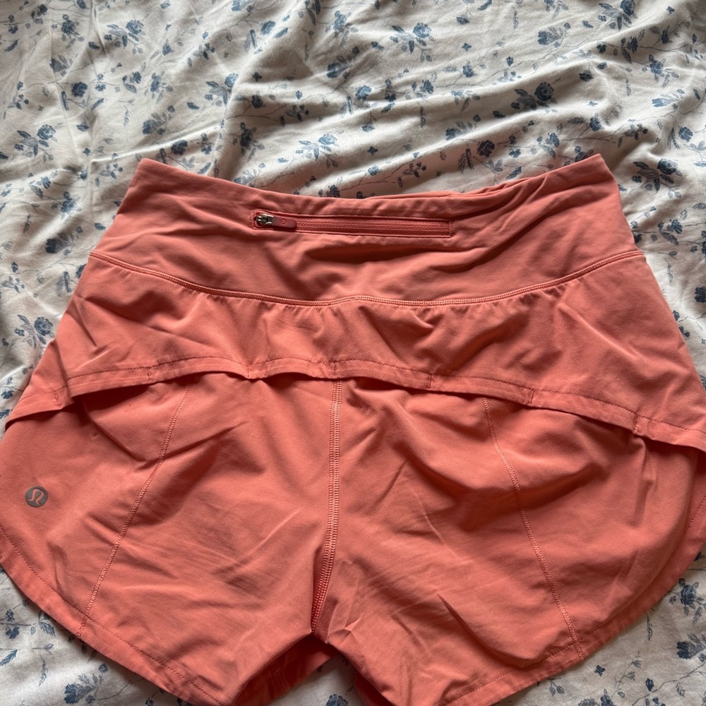 Orange lululemon shorts